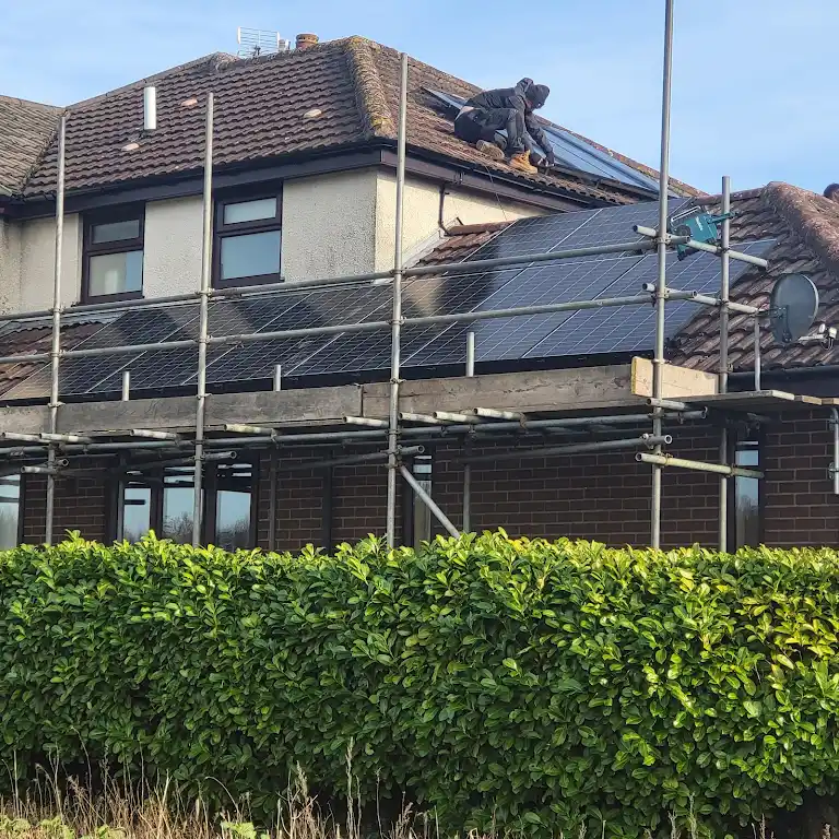 All-black solar panels fitted to a house roof in the Chester area