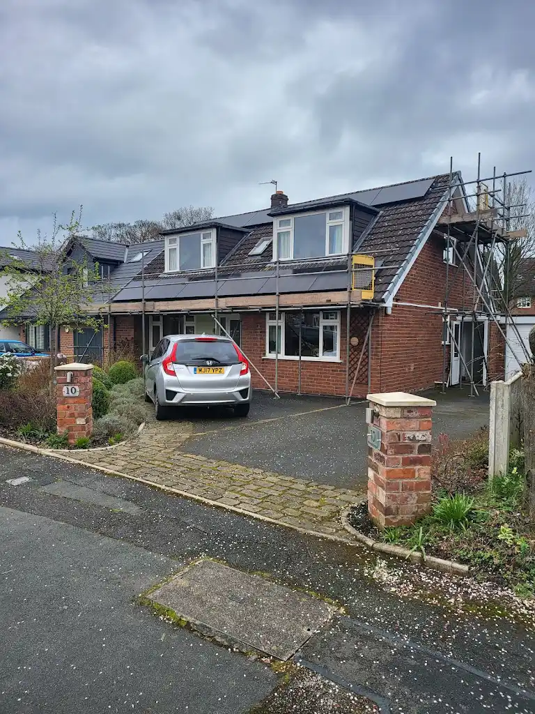 Solar panels generating clean energy on a Warrington property